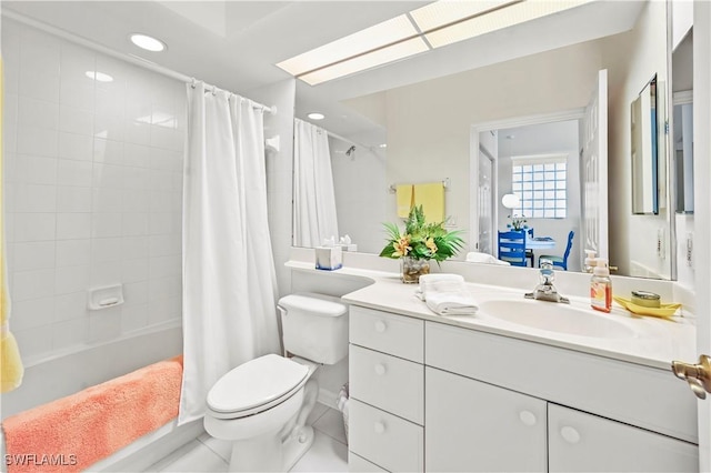 full bathroom featuring tile patterned flooring, toilet, vanity, and shower / bath combination with curtain