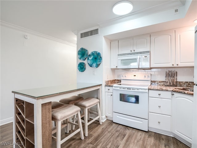 kitchen featuring light hardwood / wood-style floors, white cabinets, ornamental molding, electric range oven, and backsplash