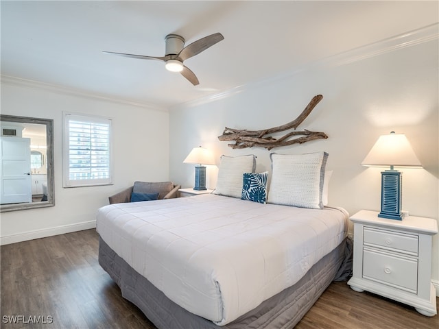 bedroom with ornamental molding, ceiling fan, and dark hardwood / wood-style floors