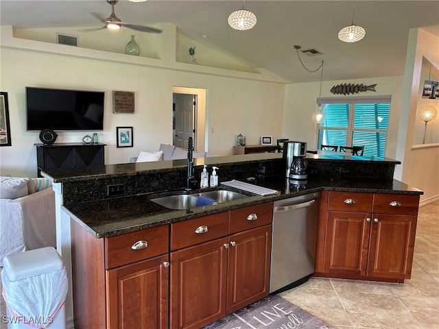 kitchen featuring dishwasher, vaulted ceiling, pendant lighting, and dark stone countertops