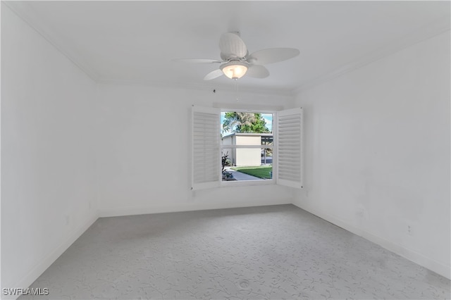 unfurnished room with ornamental molding, carpet floors, and ceiling fan