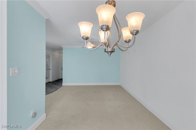 carpeted empty room with crown molding