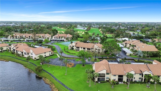 drone / aerial view with a water view