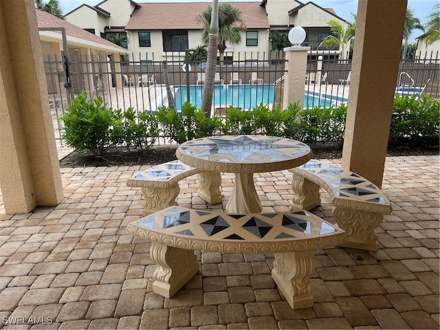 view of patio / terrace with a community pool