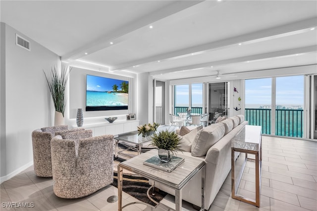 living room with beam ceiling