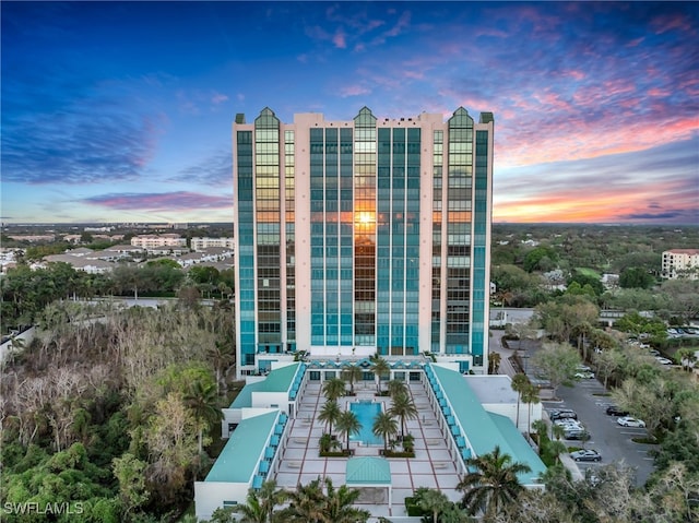 view of outdoor building at dusk