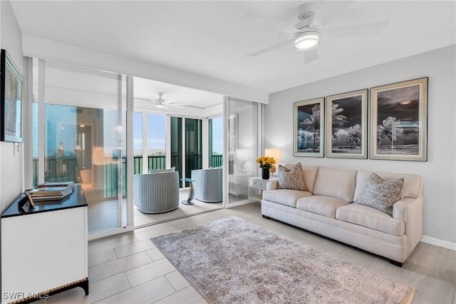 living room with ceiling fan