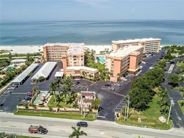 bird's eye view with a beach view and a water view