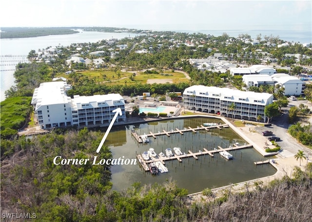 drone / aerial view with a water view