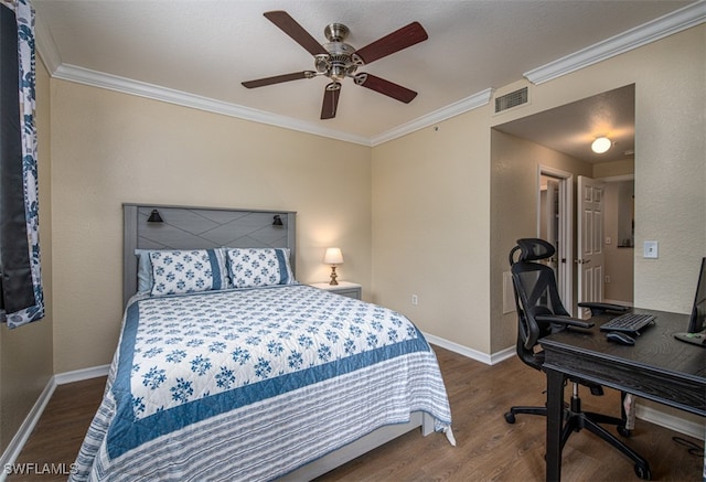 bedroom with dark hardwood / wood-style flooring, ceiling fan, and crown molding