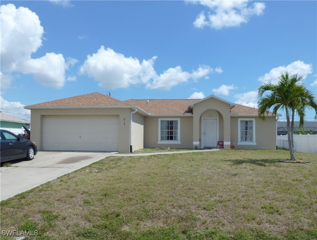 single story home with a front yard and a garage