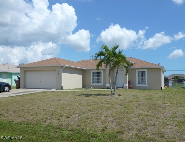 single story home featuring a front yard and a garage