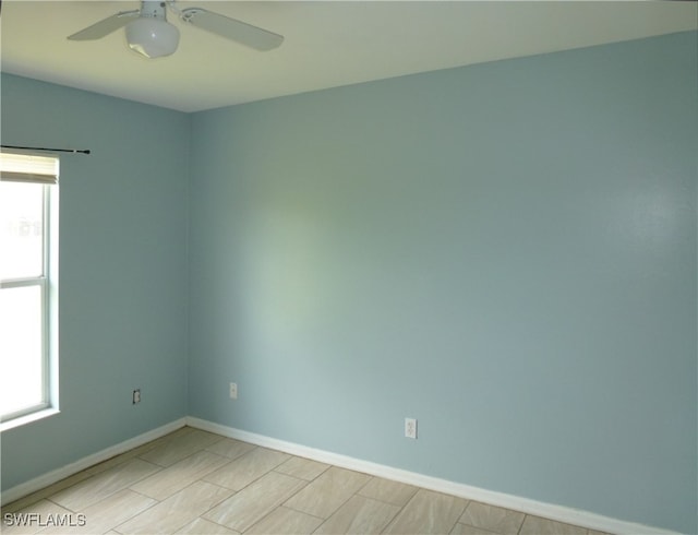 spare room featuring ceiling fan