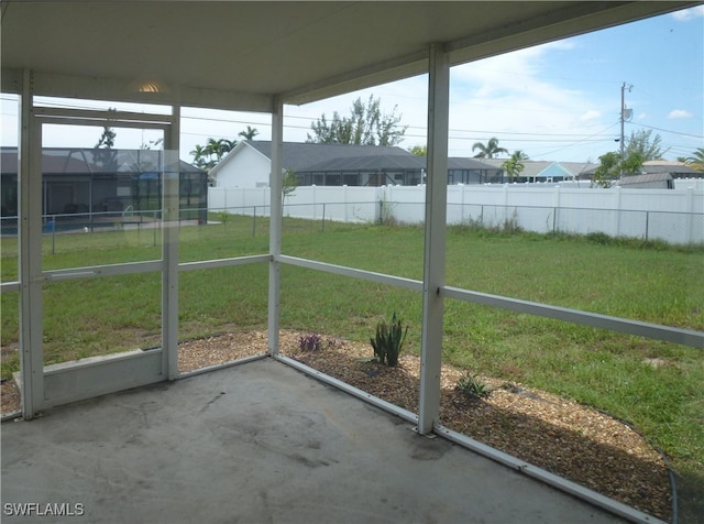 unfurnished sunroom with a wealth of natural light