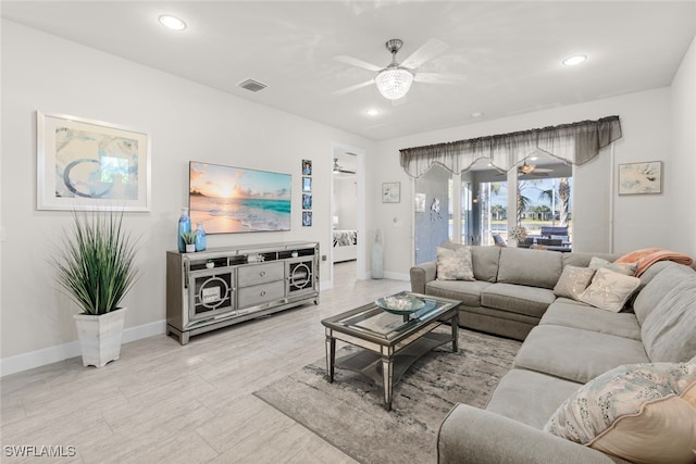 living room with ceiling fan