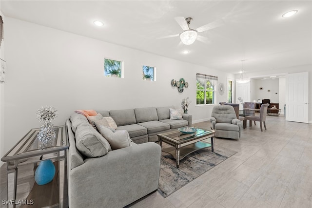 living room featuring ceiling fan