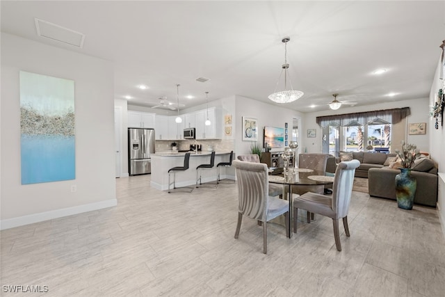 dining area featuring ceiling fan