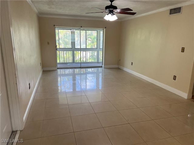 tiled empty room with ornamental molding and ceiling fan