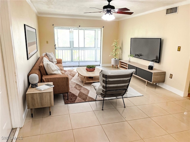 tiled living room featuring ceiling fan and crown molding