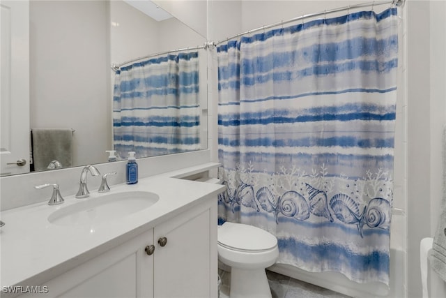 full bathroom with toilet, tile patterned floors, vanity, and shower / bath combo with shower curtain