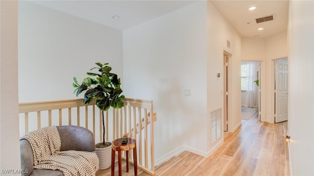 hall featuring light hardwood / wood-style flooring