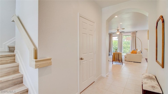 corridor with light tile patterned flooring