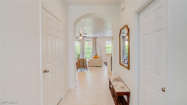 hallway with light tile patterned floors