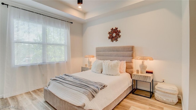 bedroom featuring hardwood / wood-style floors