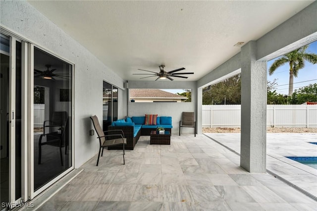 view of patio / terrace featuring ceiling fan and an outdoor hangout area