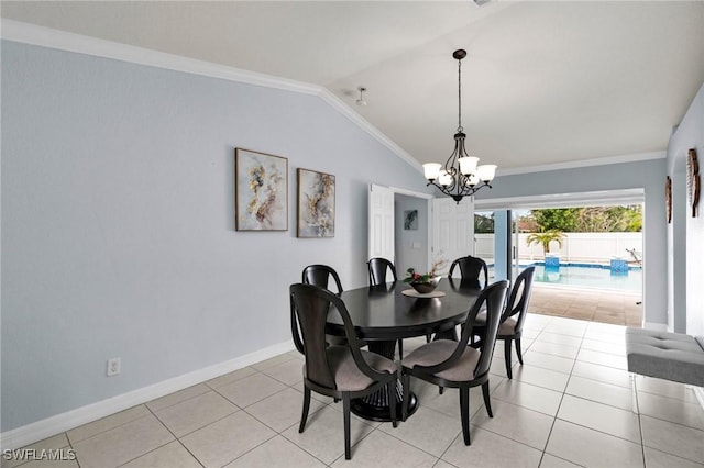 dining area featuring crown molding, light tile patterned floors, a chandelier, and lofted ceiling