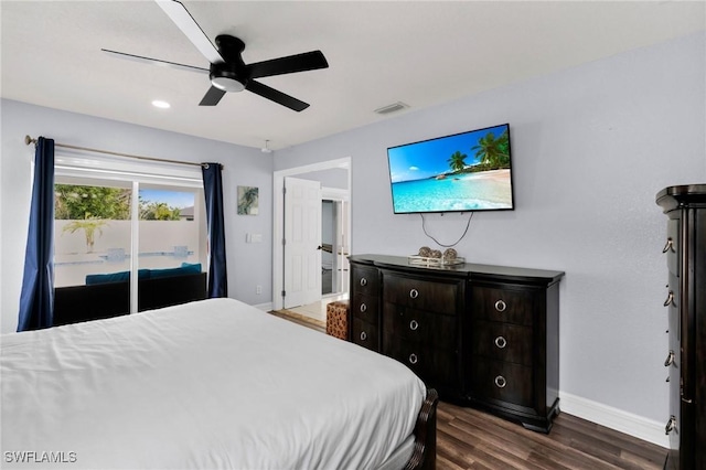 bedroom featuring access to exterior, dark hardwood / wood-style floors, and ceiling fan