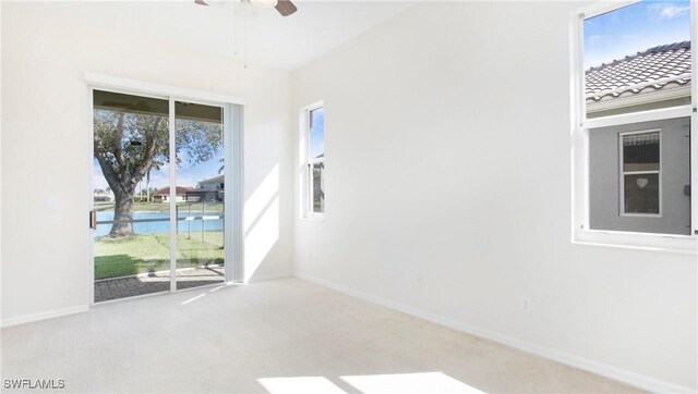 2876 Orange Grove Trl, Naples, FL 34120 - unfurnished room with carpet, ceiling fan, and baseboards