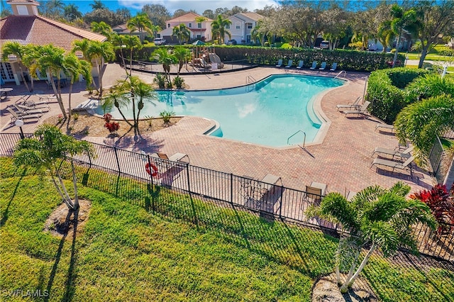 view of pool featuring a patio