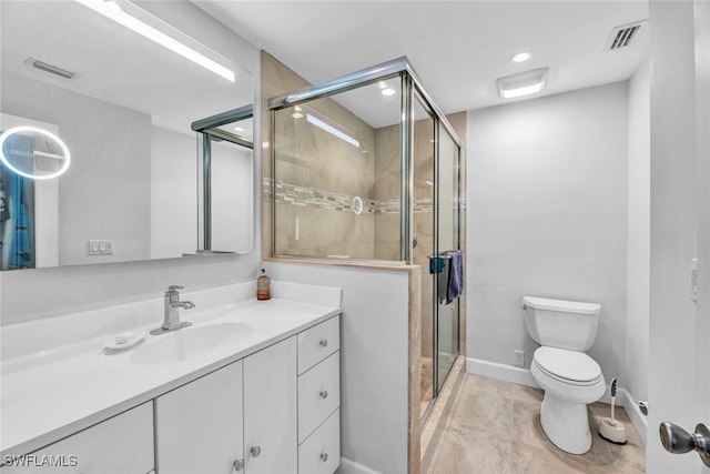 bathroom featuring walk in shower, vanity, and toilet