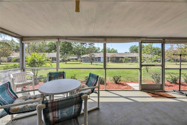 sunroom featuring wooden ceiling