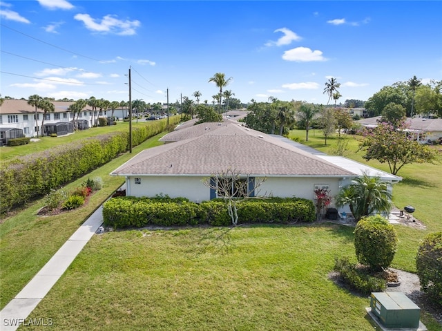 exterior space featuring a lawn