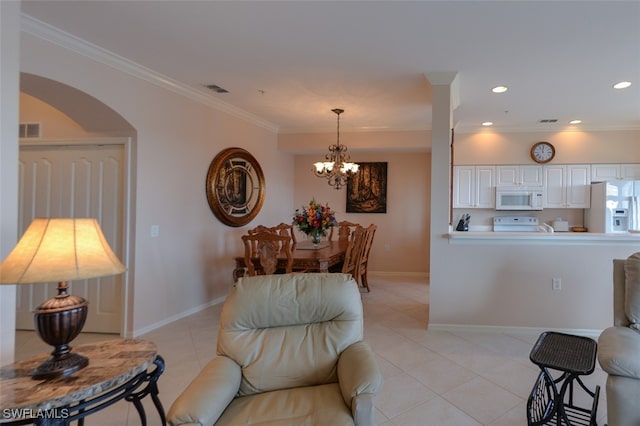 tiled living room featuring crown molding and an inviting chandelier