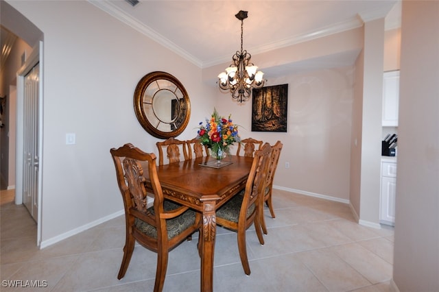 tiled dining space with a chandelier and crown molding