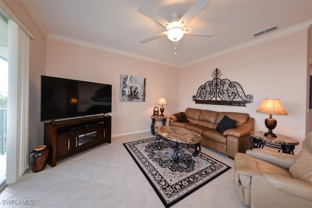 living room featuring ceiling fan, light tile patterned floors, and ornamental molding