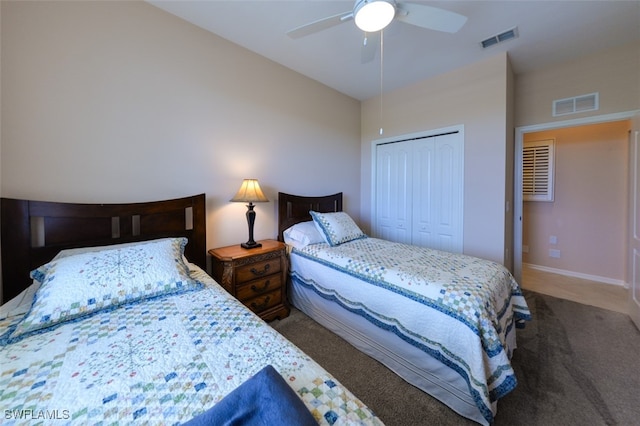 bedroom featuring carpet, ceiling fan, and a closet