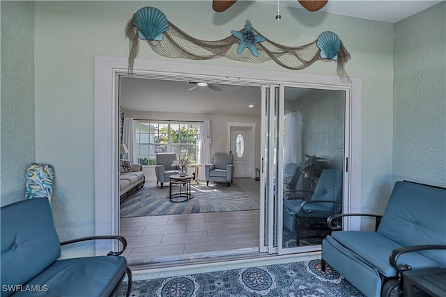 doorway to property featuring an outdoor living space