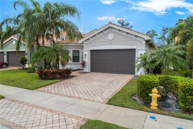 view of front of property featuring a garage