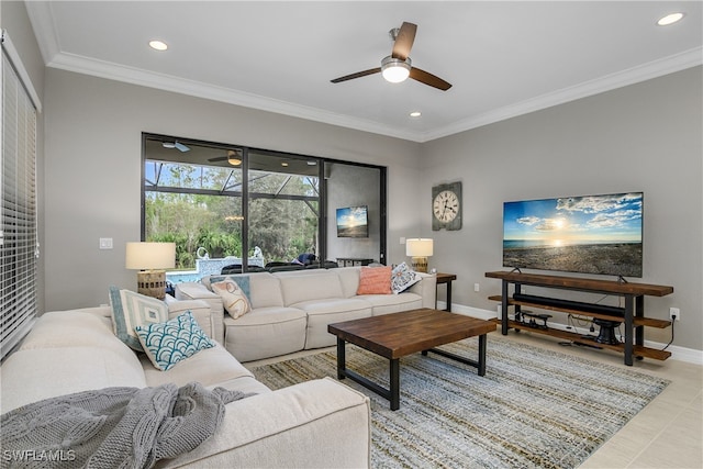 tiled living room with ceiling fan and ornamental molding