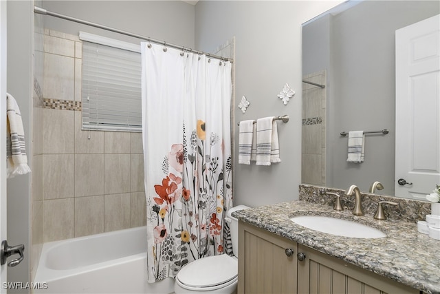 full bathroom featuring toilet, shower / bath combo, and vanity