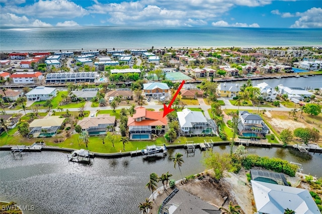 bird's eye view with a water view