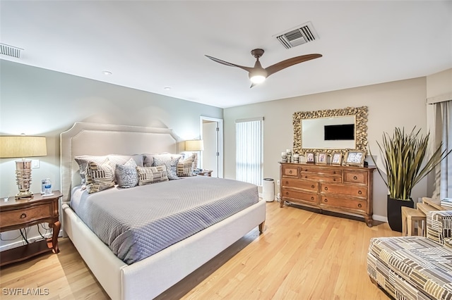 bedroom featuring ceiling fan and light hardwood / wood-style floors