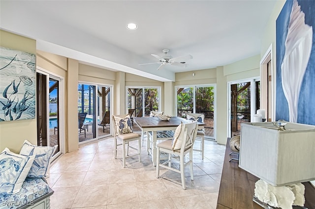 interior space with ceiling fan