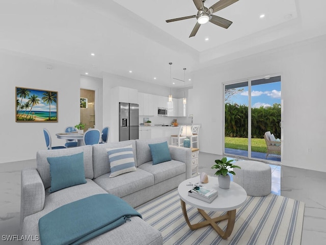 living room featuring ceiling fan