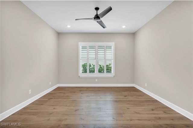 unfurnished room with light hardwood / wood-style flooring and ceiling fan