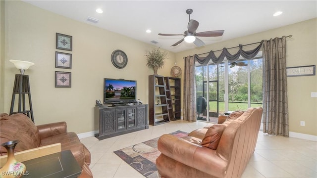 tiled living room featuring ceiling fan